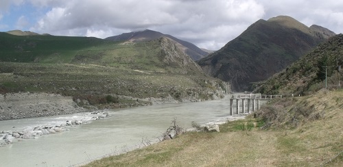 The Rangitata Diversion Race (RDR) intake. The stone wall in the Rangitata river diverts water to the intake (under the concrete columns. The water travels along a concrete tunnel (just visible) to the start of the RDR.